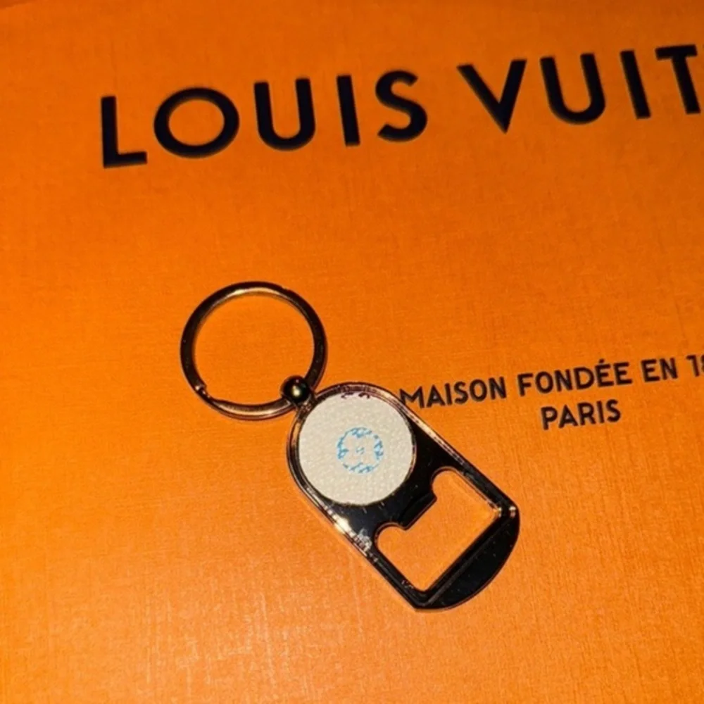 L V luxcycled Mirkami Silver Key chain bottle opener sku-1027